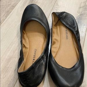Black lucky flats